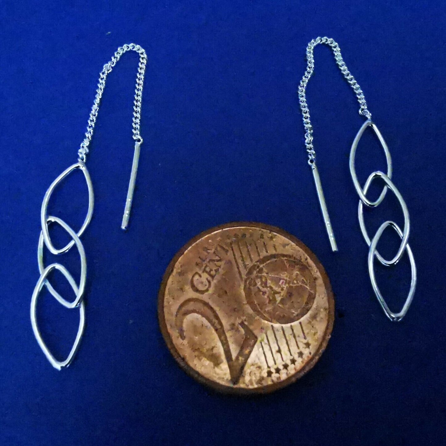 Durchzieher aus Silber mit Zapfen an Kette