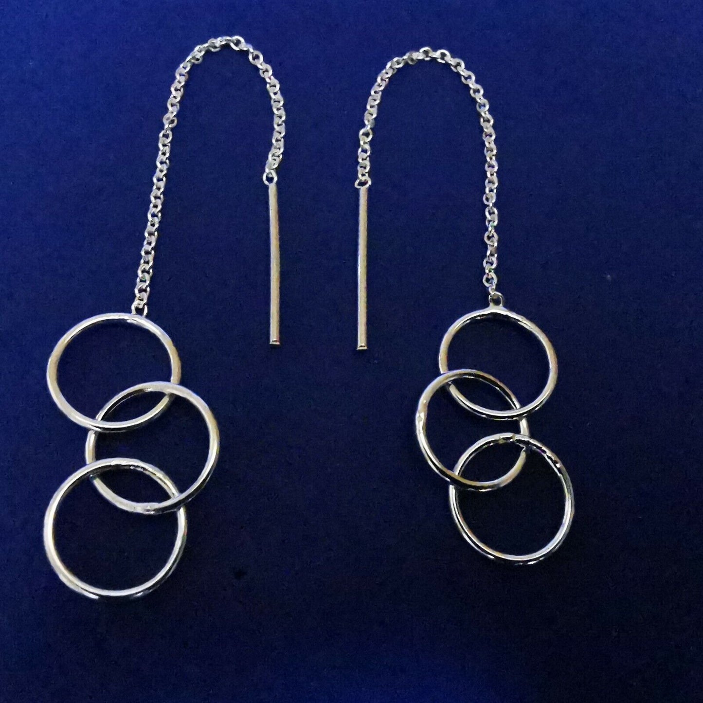 Durchzieher aus Silber mit Ringen an Kette