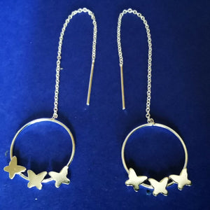 Durchzieher mit Kette und Schmetterlingen auf Ring
